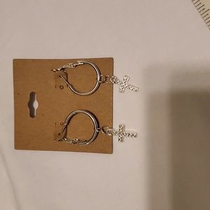 Silver colored cross earrings